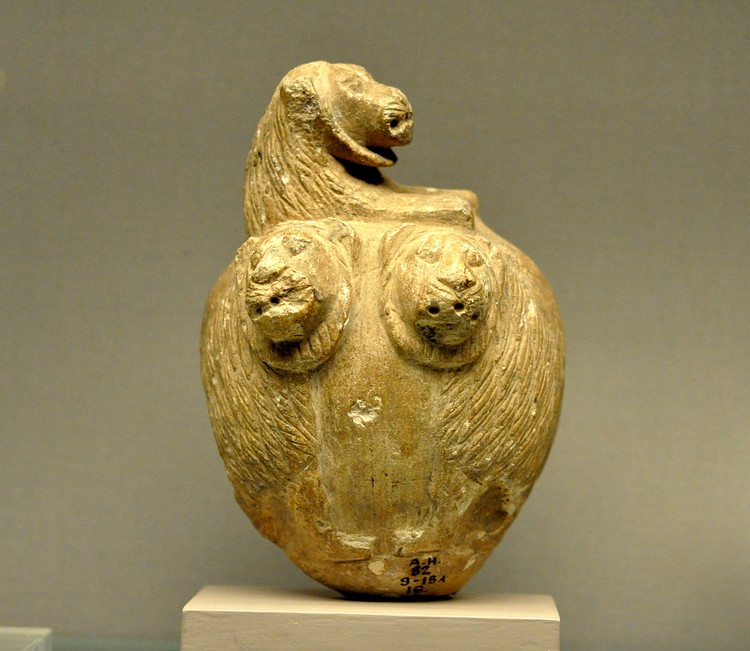 A Stone Mace Head with Lions