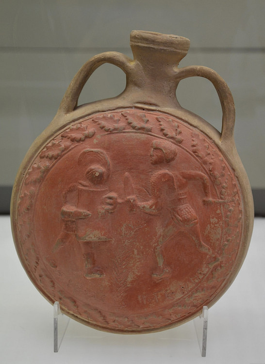 Terracotta flask with gladiators