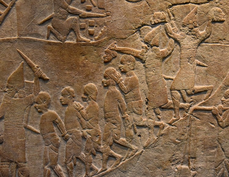 Assyrian Soldiers Holding Decapitated Heads of Nubian Soldiers